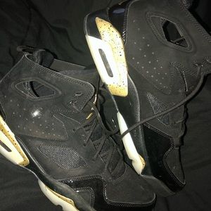 Black and gold jordans
